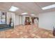 Large basement area with tile flooring and access to other rooms at 875 Cooper St, Overton, NV 89040