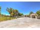 Long private driveway leading to the house and outbuildings at 875 Cooper St, Overton, NV 89040