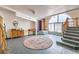 Elegant entryway with tiled floors and staircase at 875 Cooper St, Overton, NV 89040