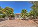 Single story house with attractive landscaping and gated entry at 875 Cooper St, Overton, NV 89040