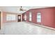 Living room with tile floors, neutral walls, and a ceiling fan at 875 Cooper St, Overton, NV 89040