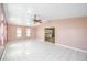 Bright living room featuring tile floors and a ceiling fan at 875 Cooper St, Overton, NV 89040