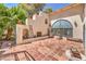 Charming tiled patio with built-in fireplace at 875 Cooper St, Overton, NV 89040