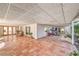 Large covered patio with terracotta tile floor, providing ample outdoor space at 875 Cooper St, Overton, NV 89040