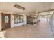 Covered patio with tile floor, ceiling fan and access to the backyard at 875 Cooper St, Overton, NV 89040