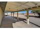 Covered patio with concrete flooring and a view of the backyard at 8870 W Craig Rd, Las Vegas, NV 89129