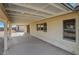 Covered patio with concrete flooring and a view of the backyard at 8870 W Craig Rd, Las Vegas, NV 89129