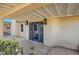 Covered patio with double doors leading to the backyard at 8870 W Craig Rd, Las Vegas, NV 89129