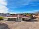 Single story home with covered patio and mountain views at 8870 W Craig Rd, Las Vegas, NV 89129