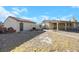Large backyard with gravel and a detached workshop at 8870 W Craig Rd, Las Vegas, NV 89129