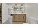 Elegant bathroom with double vanity and updated fixtures at 8870 W Craig Rd, Las Vegas, NV 89129
