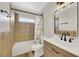 Clean bathroom with a tub shower combo and updated vanity at 8870 W Craig Rd, Las Vegas, NV 89129