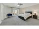 Spacious main bedroom with patio access and a king-size bed at 8870 W Craig Rd, Las Vegas, NV 89129