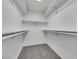 Large walk-in closet with ample shelving and hanging space at 8870 W Craig Rd, Las Vegas, NV 89129