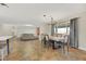 Spacious dining area with chandelier and view to living room at 8870 W Craig Rd, Las Vegas, NV 89129