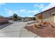House exterior showcasing a walkway and mountain views at 8870 W Craig Rd, Las Vegas, NV 89129
