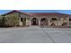 House exterior featuring a red tile roof and arched entryway at 8870 W Craig Rd, Las Vegas, NV 89129