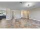 Open living area with tile floors and views to kitchen and entry at 8870 W Craig Rd, Las Vegas, NV 89129