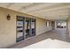 Covered patio with concrete flooring and French doors at 8870 W Craig Rd, Las Vegas, NV 89129