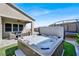 Hot tub on backyard patio with seating area at 8929 Cassia Winds St, Las Vegas, NV 89166