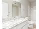 Bathroom with granite countertop, white vanity, and bathtub at 9000 Las Vegas Blvd # 1016, Las Vegas, NV 89123