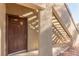 Condo building entry with brown door and exterior stairs at 9000 Las Vegas Blvd # 1016, Las Vegas, NV 89123