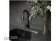 Modern kitchen with dark sink and faucet at 924 S First St # 510, Las Vegas, NV 89101