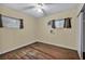 Modest bedroom features hardwood floors, natural light and closet at 111 Manganese St, Henderson, NV 89015