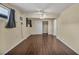 Bedroom featuring wood-look floors, neutral walls, ceiling fan, and sliding closet door at 111 Manganese St, Henderson, NV 89015