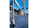 Daytime street view showing restaurant patio and pedestrian walkway at 111 Manganese St, Henderson, NV 89015