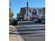 Street view in the Water Street District showcasing pedestrian-friendly sidewalks, retail stores, and the movie theater at 111 Manganese St, Henderson, NV 89015