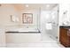 Spa-like bathroom with soaking tub and walk-in shower at 135 E Harmon Ave # 3416, Las Vegas, NV 89109