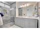 Elegant bathroom boasts double vanity and walk-in shower at 1474 Fieldbrook St, Henderson, NV 89052