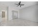 Bedroom with a ceiling fan and a mirrored sliding closet door at 1474 Fieldbrook St, Henderson, NV 89052