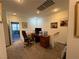 Upstairs office area with a desk and chair at 1571 Plaza Centre Dr # 102, Las Vegas, NV 89135