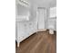 Updated bathroom with white vanity and shower at 1819 Bassler St, North Las Vegas, NV 89030