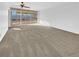 Bright living room with large window and view of backyard at 1819 Bassler St, North Las Vegas, NV 89030