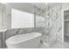 Spa-like bathroom with soaking tub and walk-in shower at 2140 Upland Ave, Pahrump, NV 89048