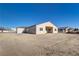 Single-story home boasting a spacious backyard and covered patio, perfect for outdoor living and entertaining at 2140 Upland Ave, Pahrump, NV 89048