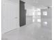Bright living room with white marble floors and modern finishes at 2140 Upland Ave, Pahrump, NV 89048