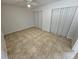 Spacious bedroom with tile floors and mirrored closet at 2208 W Washington Ave, Las Vegas, NV 89106