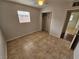 Bedroom with tile floors, closet and window at 2208 W Washington Ave, Las Vegas, NV 89106