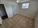 Bright bedroom with tile floors and ceiling fan at 2208 W Washington Ave, Las Vegas, NV 89106