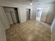 Spacious bedroom featuring tile floors and ample closet space at 2208 W Washington Ave, Las Vegas, NV 89106