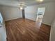 Spacious living room with wood-look floors and ceiling fan at 2208 W Washington Ave, Las Vegas, NV 89106