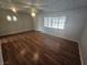 Spacious living room with wood-look floors and ceiling fan at 2208 W Washington Ave, Las Vegas, NV 89106