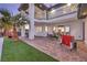 Spacious backyard with patio, built-in grill, and lawn at 282 E Maulding Ave, Las Vegas, NV 89123