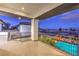 Covered balcony with pool and distant views at 282 E Maulding Ave, Las Vegas, NV 89123