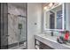 Bathroom with a modern vanity and frameless shower at 282 E Maulding Ave, Las Vegas, NV 89123