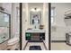 Modern bathroom with a floating vanity and walk-in shower at 282 E Maulding Ave, Las Vegas, NV 89123